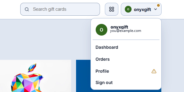 The account menu open, showing Dashboard, Orders, Profile and Sign out, with an amber warning triangle beside Profile